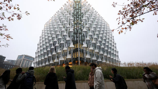 People queue outside the U.S. embassy in London 