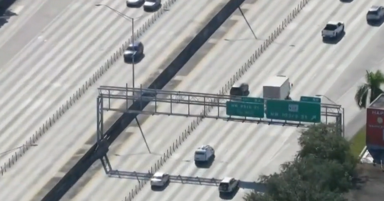 Woman shot while driving on I-95 in Miami-Dade; FHP seeks white Honda sedan Woman shot while driving on I-95 in Miami-Dade; FHP seeks white Honda sedan