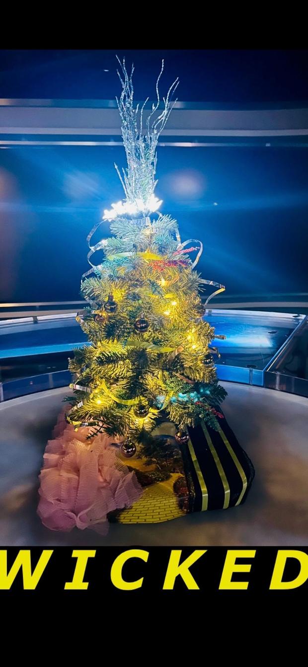 A "Wicked" themed holiday tree with lights designed by Miana Massey and Rachael Jay for the 2024 Festival of Trees. 