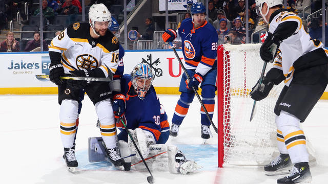 Pavel Zacha #18 of the Boston Bruins scores at 13:23 of the third period against Ilya Sorokin #30 of the New York Islanders at UBS Arena on November 27, 2024 in Elmont, New York. 