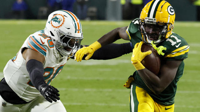 Dolphins Packers Football 