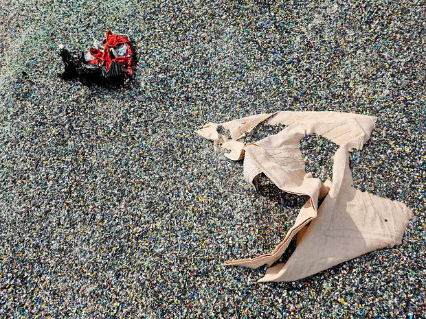 Untreated and shredded plastic waste, which is left unattended, is piled up at an inoperative recycling site in Asan, South Korea, Nov. 19, 2024. 