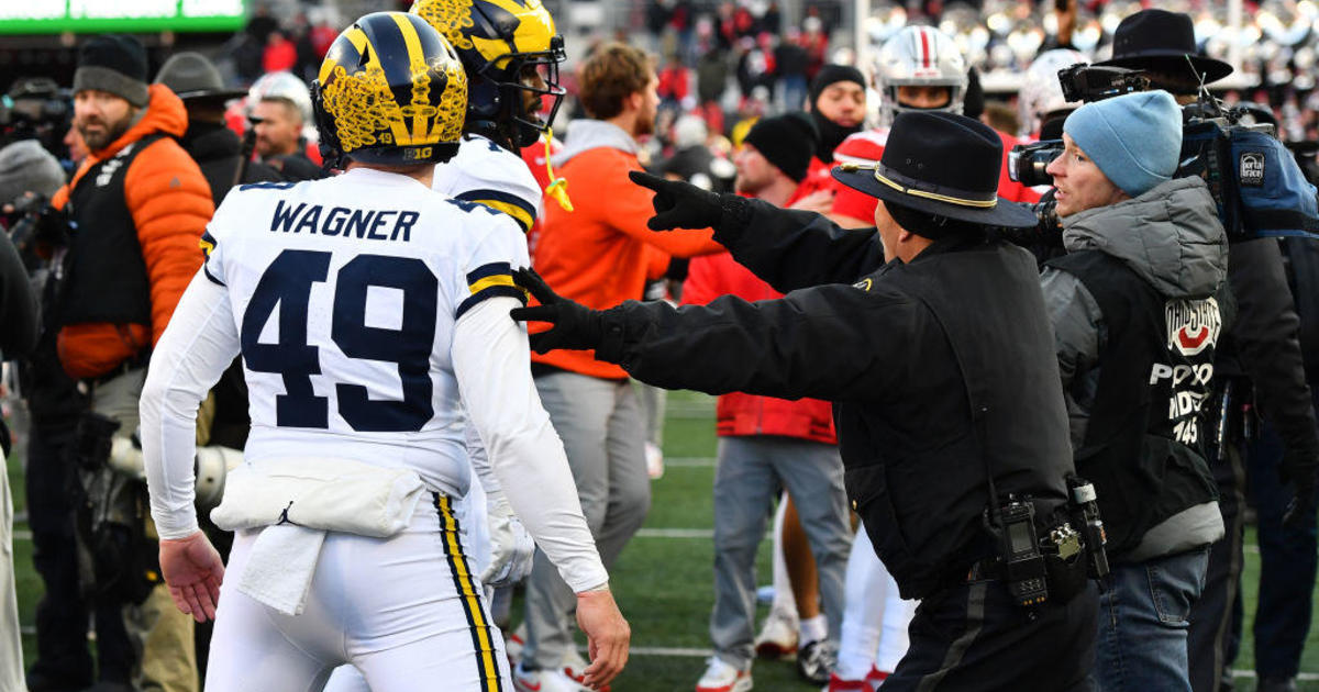 Police use pepper spray when brawl breaks out after Michigan upsets Ohio State