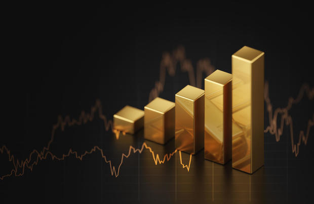 Growth gold bar financial investment stock diagram on 3d profit graph background of global economy trade price business market concept or capital marketing golden banking chart exchange invest value. 