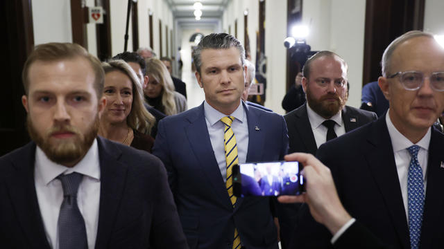 President-elect Donald Trump's nominee to be Secretary of Defense Pete Hegseth and his wife Jennifer Rauchet walk through the Russell Senate Office building on Capitol Hill on December 3, 2024 in Washington, DC. 