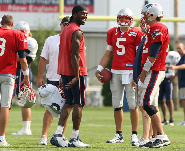 (081609 Foxboro, MA) New England Patriots wide receiver Randy Moss joked around with quarterbacks Tom Brady, right and Kevin O'Connell as the New England Patriots practice at Gillette Stadium on Sunday, August 16, 2009. Staff Photo by Matthew West 