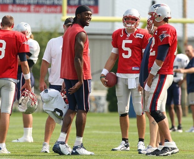 (081609 Foxboro, MA) New England Patriots wide receiver Randy Moss joked around with quarterbacks Tom Brady, right and Kevin O'Connell as the New England Patriots practice at Gillette Stadium on Sunday, August 16, 2009. Staff Photo by Matthew West