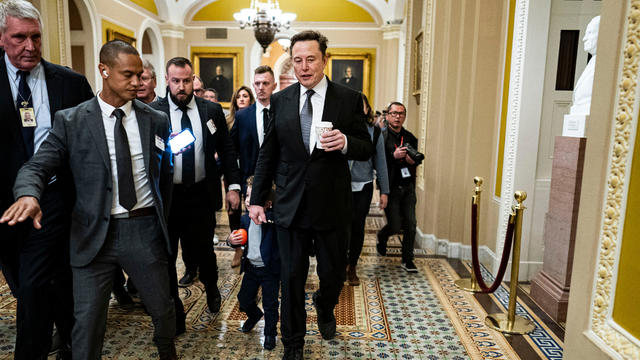 Elon Musk speaks with U.S. President-elect Donald Trump as they watch the launch of the sixth test flight of the SpaceX Starship rocket on November 19, 2024 in Brownsville, Texas. 