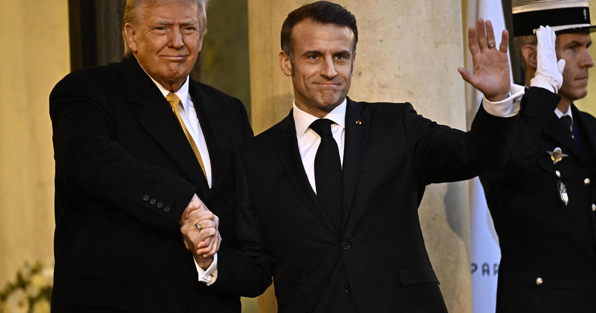 Trump welcomed by French president ahead of Notre Dame festivities