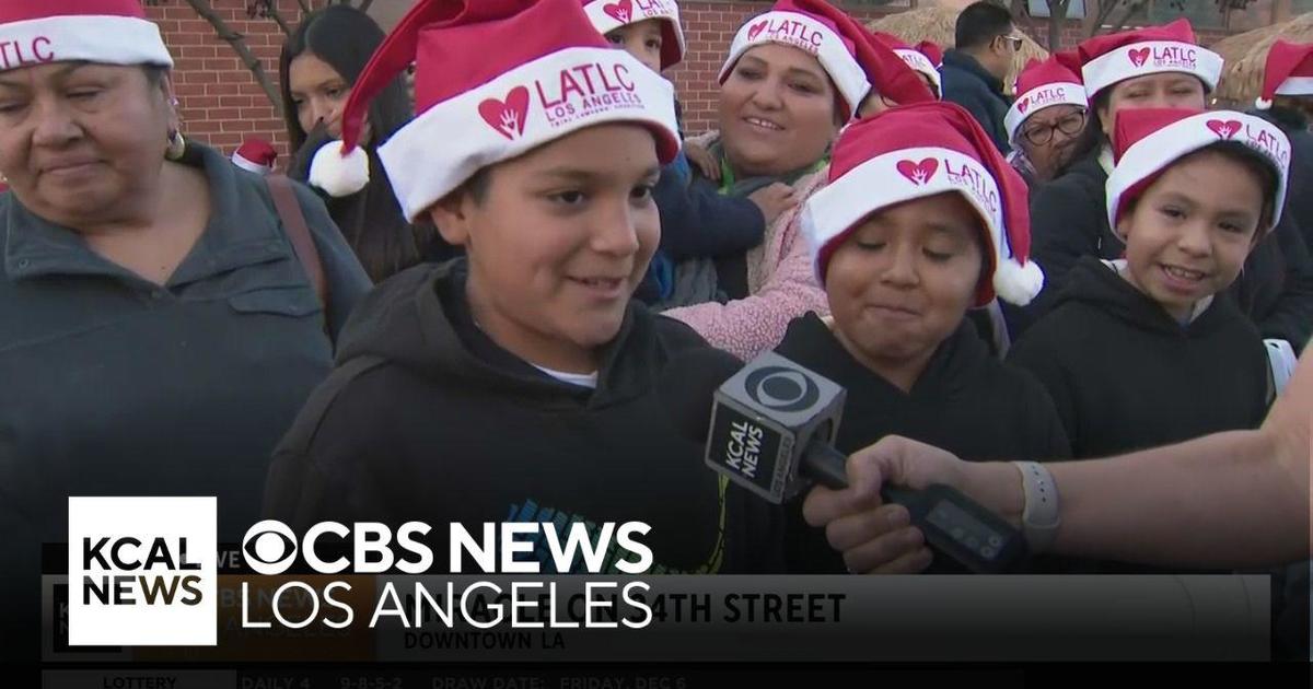 Kids at LA's "Miracle on 34th Street" event are on the lookout for Santa