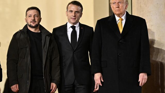 French President Emmanuel Macron (C), President-elect Donald Trump (R) and Ukraine's President Volodymyr Zelenskyy pose after their meeting at the Elysee Palace in Paris, France on December 07, 2024. 