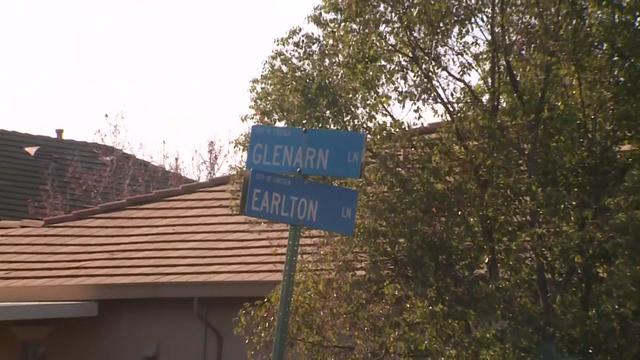 Close Up Shot Focused on Yellow Tape Showing Text Police Line Do Not Cross. Restricted Area of a Crime Scene. Bokeh Background with Flickering Siren Lights. Forensics Team Working on a Case 