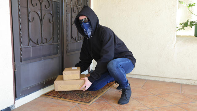 Porch Pirate Person in Glasses Steals Packages 