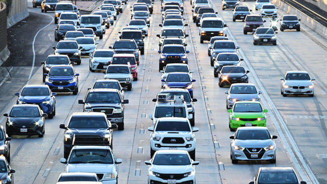 Cars make their way in traffic on a Los Angeles freeway on Jan. 25, 2024. 