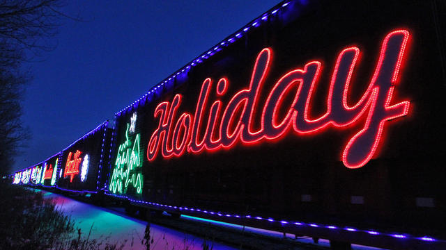 The annual Canadian Pacific Holiday Train festooned with Christmas lights pulled into Loretto Thursday afternoon to perform a short seasonal show to hundreds standing trackside. The Holiday train pulled out of Loretto after dark with lights ablaze. (MARLI 