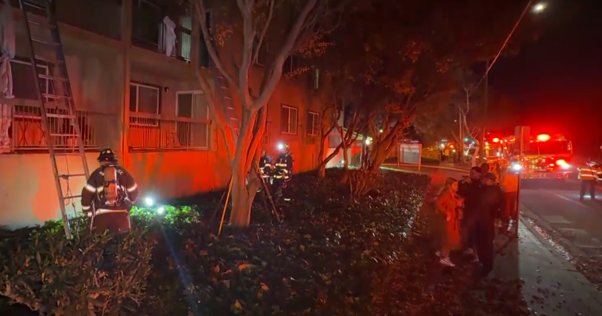 San Jose firefighters rescued several residents from a two-alarm apartment building fire