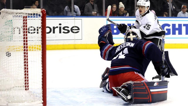 Alex Turcotte #15 of the Los Angeles Kings scores a goal against Igor Shesterkin #31 of the New York Rangers during the first period at Madison Square Garden on December 14, 2024 in New York City. 