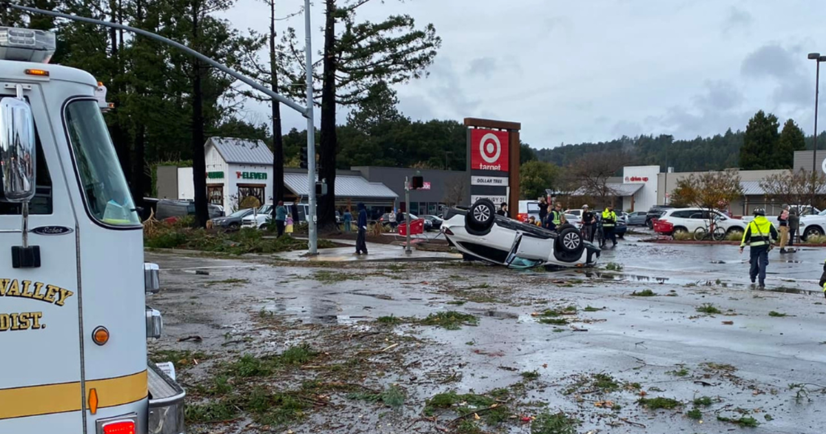 The tornado touches down near Santa Cruz in Northern California, overturning cars and downing power lines