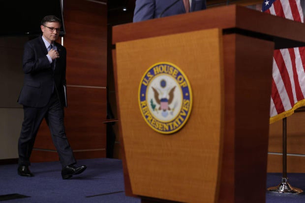 House Speaker Mike Johnson arrives at a news conference at the U.S. Capitol on Dec. 17, 2024, in Washington, D.C. 