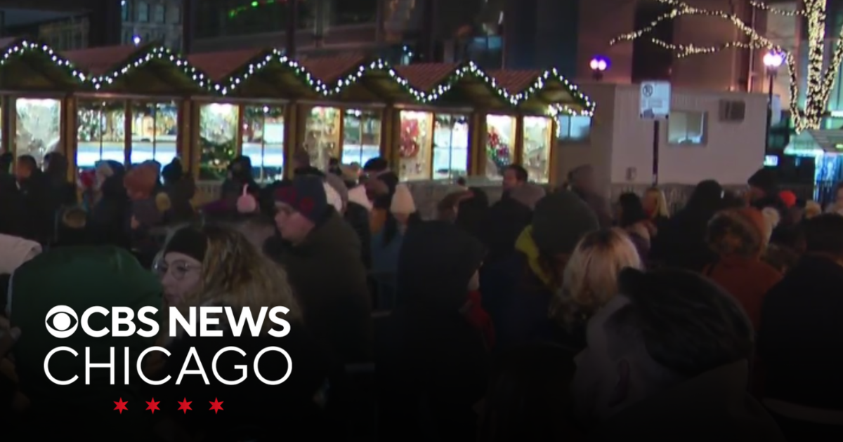 A large crowd gathers at Christkindlmarket in downtown Chicago