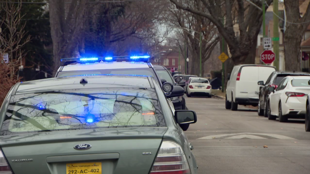 Accident or crime scene concept - flashing police lights 