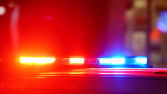 Accident or crime scene concept - flashing police lights