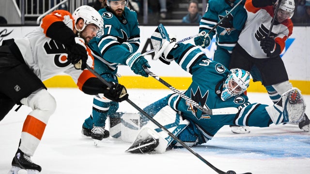 San Jose Sharks goaltender Alexandar Georgiev (40) can't stop a shot by Philadelphia Flyers center Ryan Poehling during the second period of an NHL hockey game 