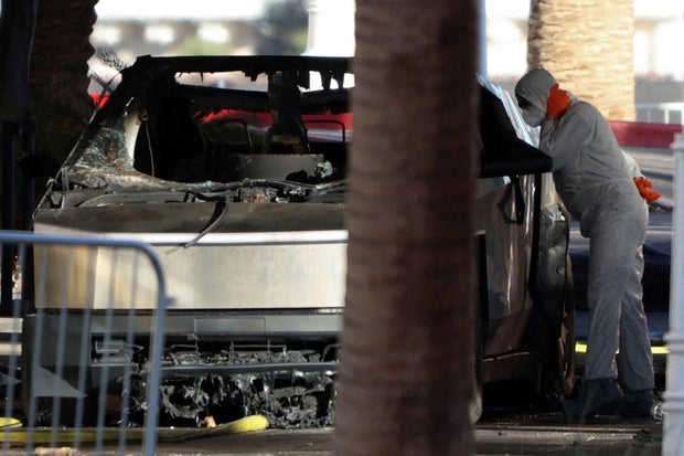 The remains of a Tesla Cybertruck that exploded and burned at the entrance of Trump Tower in Las Vegas