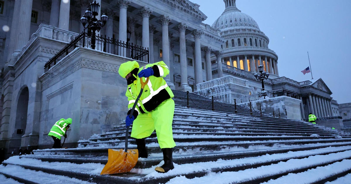 See photos of snow in Washington, D.C., as nation's capital gets multiple inches