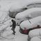 Dangerous weather conditions in U.S. as snow blankets several states