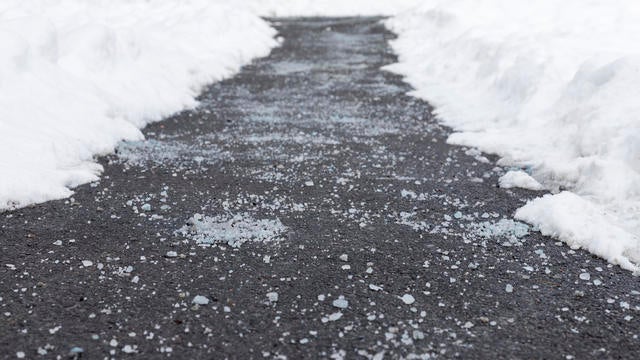 Road with salt and snow on the sides 