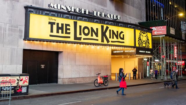 Minskoff Theatre exterior with "The Lion King" Broadway musical marquee illuminated, New York City, New York, October 21, 2024. 