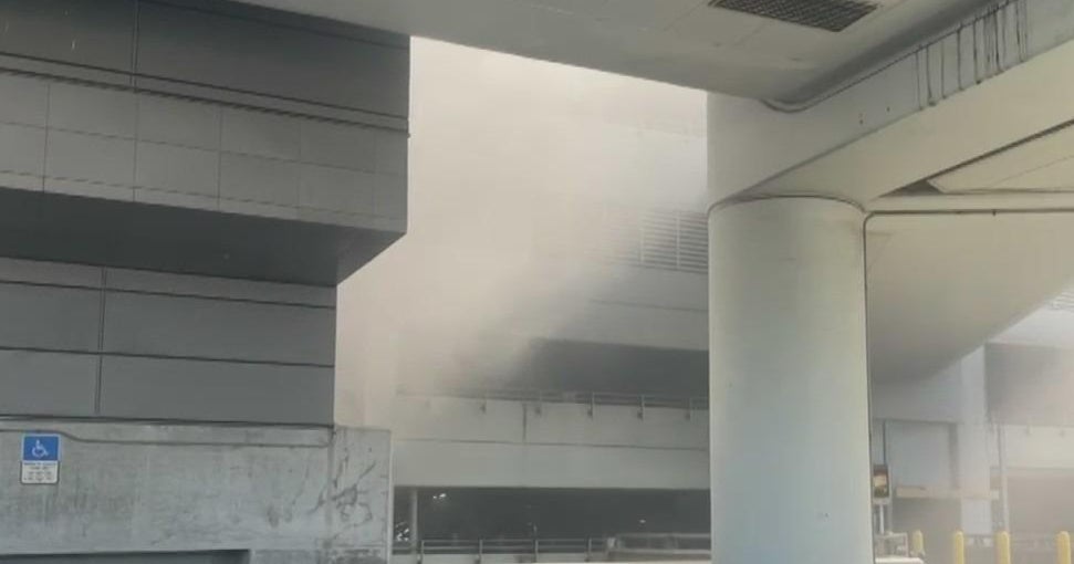 Car bursts into flames in Miami International Airport parking garage Car bursts into flames in Miami International Airport parking garage