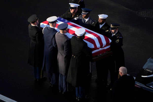 Funeral Procession Brings Body Of Former President Jimmy Carter To U.S. Capitol Building 