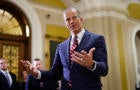 Senate Majority Leader John Thune speaks to the press after paying his respects in front of the flag-draped casket at the Lying in State Ceremony for former President Jimmy Carter at the US Capitol Rotunda in Washington, DC on January 8, 2025. 