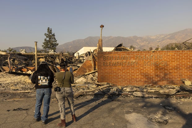 LA Fire Crews Make Strides In Fighting Blazes As Toll Climbs
