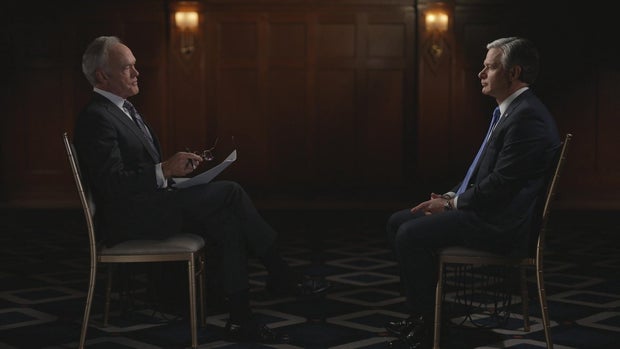 Scott Pelley and Christopher Wray