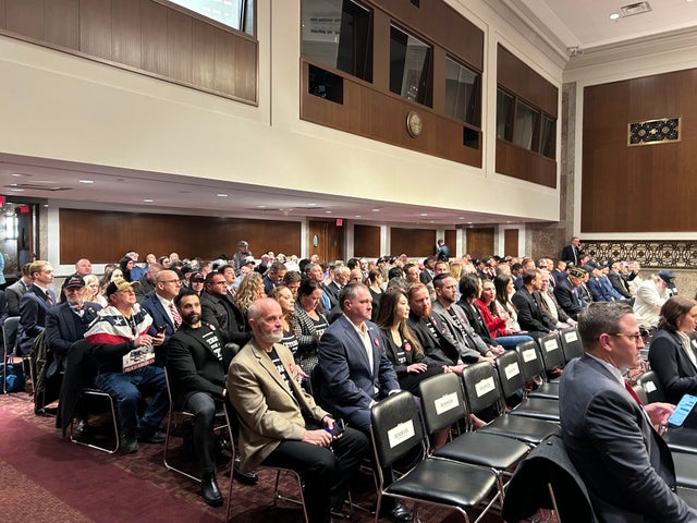Members of the public gather before Pete Hegseth's confirmation hearing on Capitol Hill on Tuesday, Jan. 14, 2025. 