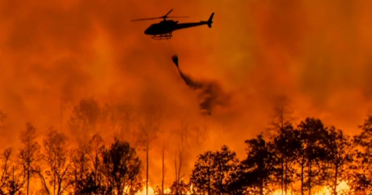 Los Angeles braces for heavy winds as fires burn