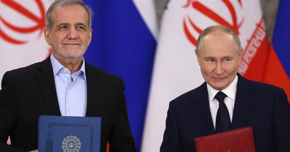 Putin and Iran's president sign 20-year treaty, strengthening ties