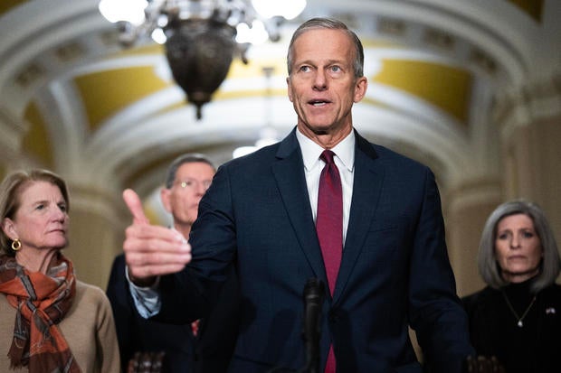 Senate Majority Leader John Thune, center, conducts a news conference after the senate luncheons in the U.S. Capitol on Tuesday, December 17, 2024.