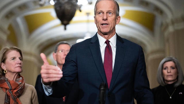 Senate Majority Leader John Thune, center, conducts a news conference after the senate luncheons in the U.S. Capitol on Tuesday, December 17, 2024. 