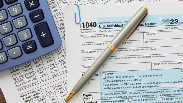 Tax form with a calculator 