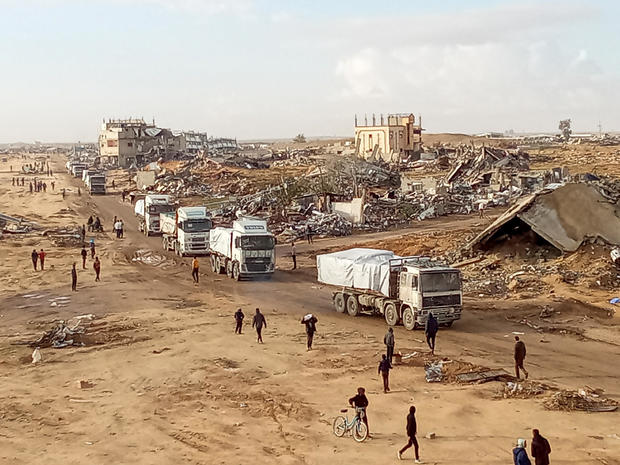 Aid trucks cross into the Gaza Strip 