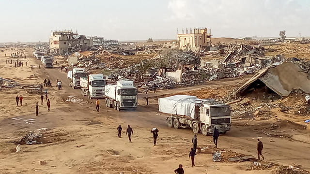 Aid trucks cross into the Gaza Strip 