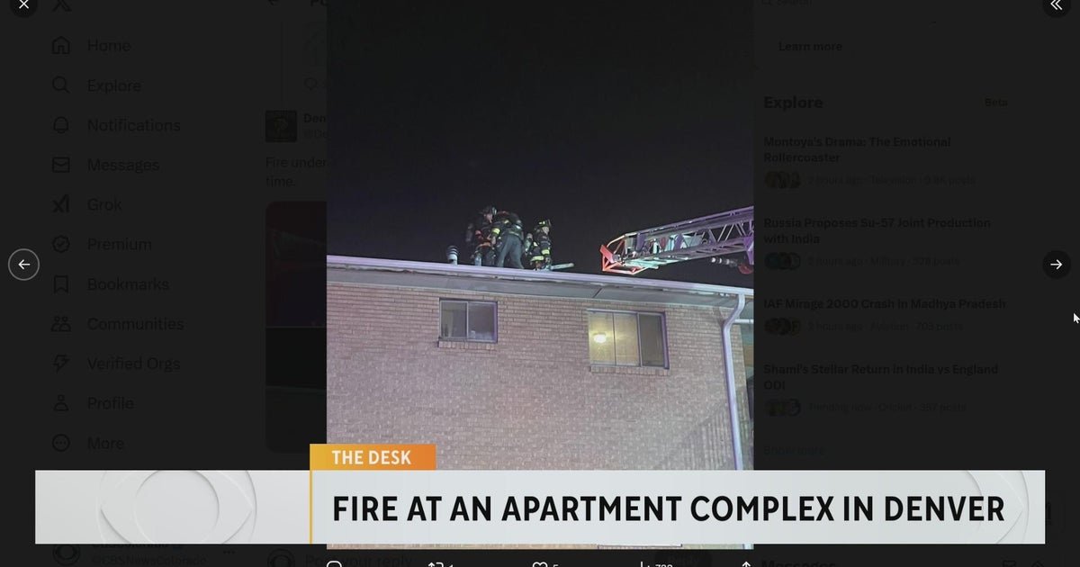 Denver firefighters rush to burning apartment building - CBS Colorado
