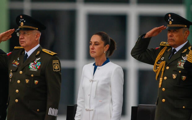 Mexico's President Claudia Sheinbaum receives military honors during the 112th anniversary of the Mexican army in Cerralvo, Nuevo Leon state, Mexico, Feb. 19, 2025. 