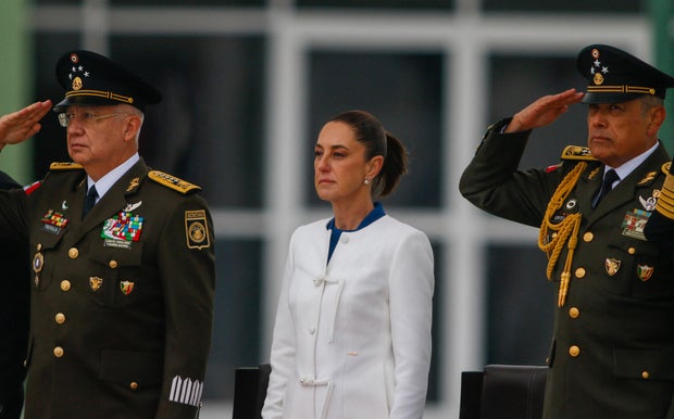 Mexico's President Claudia Sheinbaum receives military honors during the 112th anniversary of the Mexican army in Cerralvo, Nuevo Leon state, Mexico, Feb. 19, 2025.