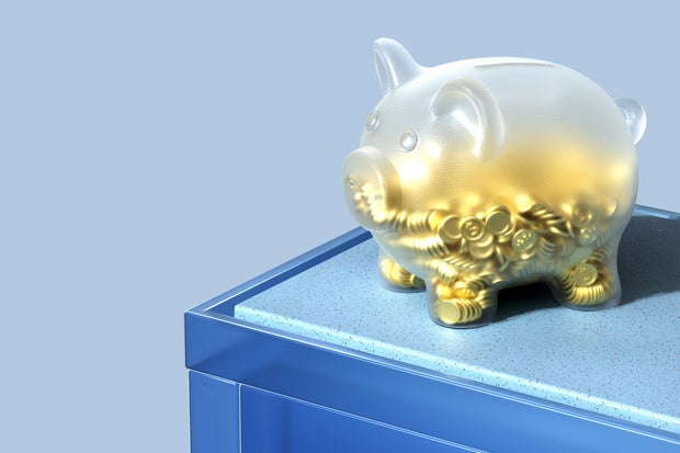 Glowing Glass Piggy Bank With Gold Dollar Coins