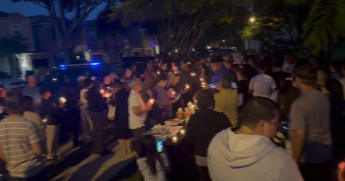 Dozens come together in Broward vigil, demanding action after triple murder Dozens come together in Broward vigil, demanding action after triple murder